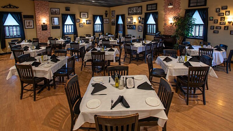 Dining room with many set tables
